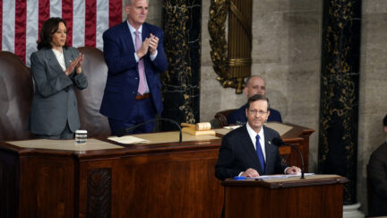 Israeli President Isaac Herzog speaks to a joint session of Congress, Wednesday, July 19, 2023, at the Capitol in Washington, as Vice President Kamala Harris and House Speaker Kevin McCarthy of Calif., look on.